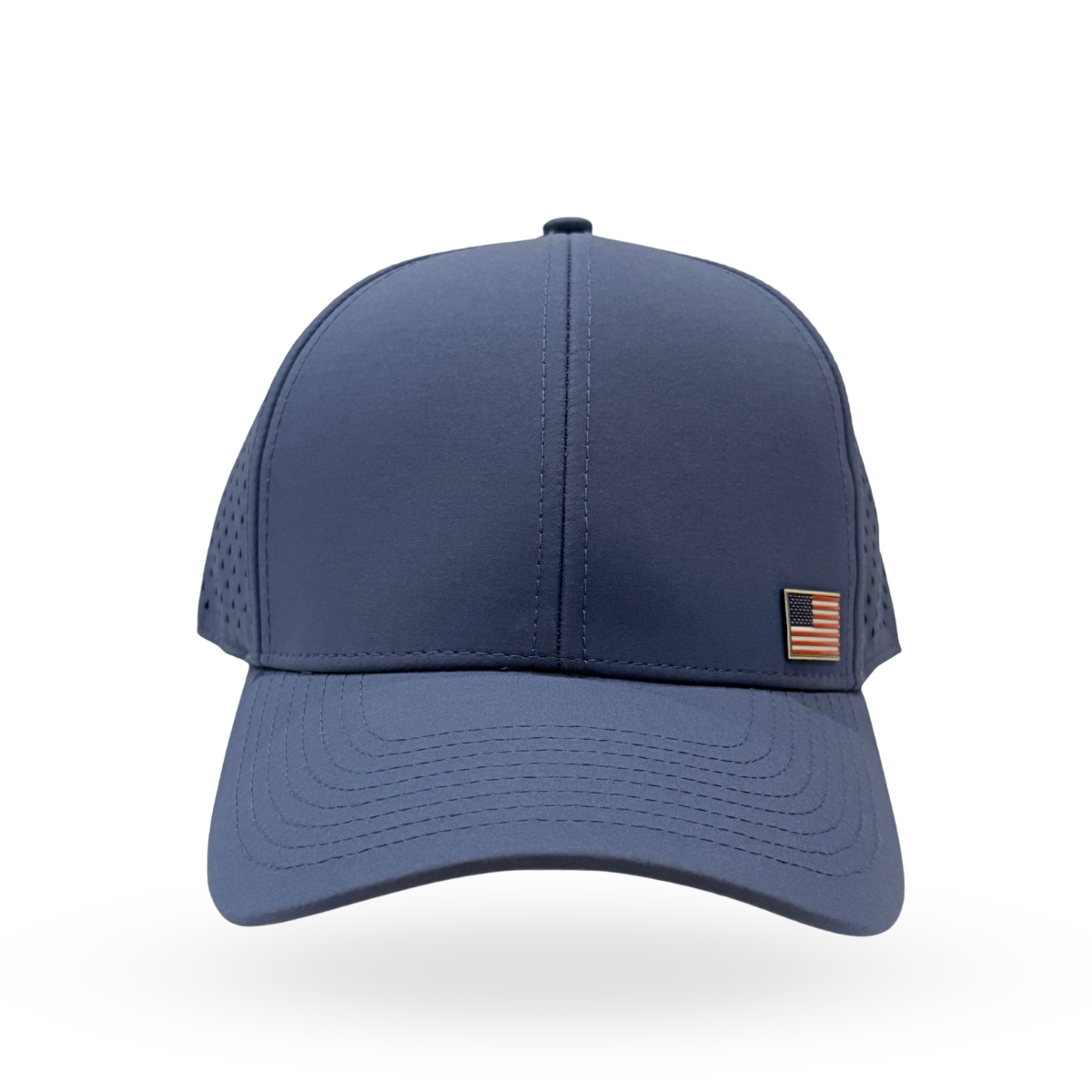 A navy blue baseball cap with a structured front panel, perforated side panels, and a small American flag patch on the side, shown against a plain white background.