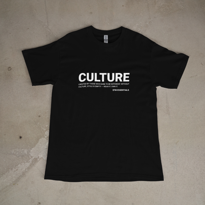 Black t-shirt with 'CULTURE' text on a beige surface