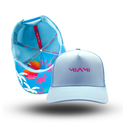 A trucker hat with a blue front panel and a multicolored mesh back, featuring the text 'MIAMI' on the front.