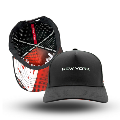 A black baseball cap with 'NEW YORK' text on the front and a signature modern design, featuring a red and white pattern inside the crown.